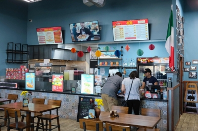 Fear on the menu: How ICE raids are emptying Latino restaurants in Texas An employee (right) serves customers at a Mexican restaurant in Houston September 10, 2025. — AFP pic
