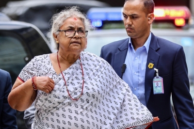 Nepal’s new leader bows to Gen Z protest demands, vows to ‘end corruption’ Newly-elected interim Prime Minister of Nepal Sushila Karki arrives at the Civil Service Hospital in Kathmandu on September 13, 2025, to visit victims injured during clashes with security personnel. — AFP pic