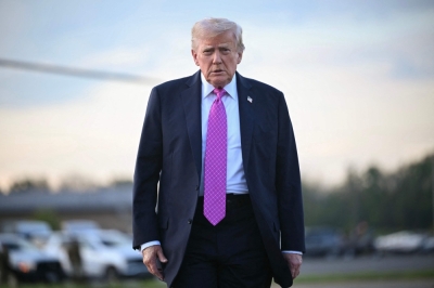 Trump moves to calm backlash, says US will ‘welcome’ foreign workers despite latest South Korean crackdown US President Donald Trump walks to board Air Force One at Morristown Municipal Airport in New Jersey on September 14, 2025, after spending the weekend at his Bedminster residence. — AFP pic