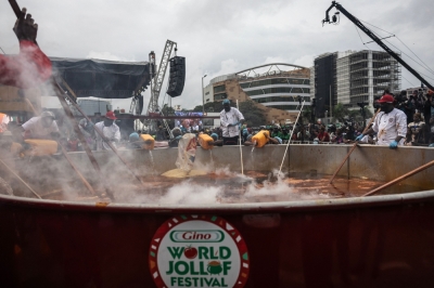 ‘We’ve done it again’: Nigerian chef Hilda Baci sets Guinness World Record with giant pot of jollof rice in Lagos Staff members stir rice as other pour water in a giant pot during an attempt to break the world record for the largest pot of Jollof rice, led by Nigerian chef Hilda Baci in Lagos September 12, 2025.  — AFP pic