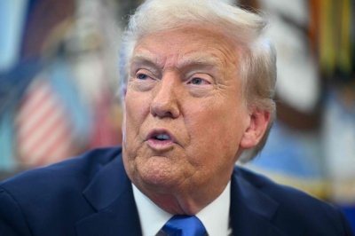 Trump hits H-1B visas, a tech industry favourite, with US$100,000 fee US President Donald Trump speaks before signing executive orders in the Oval Office at the White House in Washington, DC, on September 19, 2025.  — AFP pic