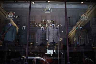 From stitches to style: Apprentices breathe new life into old-school tailoring at historic Savile Row Suits on display inside the window of Henry Poole & Co on Savile Row in London on August 12, 2025. Beneath the old-world exterior of a tailors on London's famed Savile Row, the workshop where the magic happens is more youthful than ever as aspiring coatmakers vie for competitive apprenticeships. — AFP pic