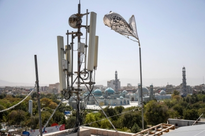 ‘Not possible’: Trump wants Bagram back, but Afghan Taliban official says US deal is off the table A Taliban flag flutters near telecom equipment installed over a rooftop providing internet services overlooking Hazrat-e-Ali Shrine, or Blue Mosque, in Mazar-i-Sharif on September 16, 2025, as the Taliban administration banned fibre-optic internet in Balkh province. — AFP pic
