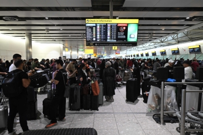 European airports begin recovery after cyberattack cripples check-in systems Travellers wait in terminal 4 at Heathrow Airport, west of London on September 20, 2025. — AFP pic