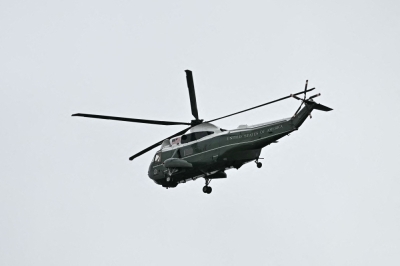 Man faces felony for shining laser pointer at helicopter carrying Trump One of three helicopter's in US President Donald Trump entourage flies over Windsor Castle, in Windsor September 17, 2025. US authorities charged a man who shone a laser pointer at the presidential helicopter as it departed the White House with President Trump aboard, according to a court filing yesterday. — AFP pic