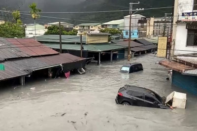 Taiwan hit by worst flood in years as Super Typhoon Ragasa triggers barrier lake collapse, killing 14, 124 missing (VIDEO) A car is seen stuck in floodwaters in Hualien on September 23, 2025, after a barrier lake burst and flooded the Guangfu township. The bursting of the barrier lake in Taiwan killed at least 14 people, regional officials said today after Super Typhoon Ragasa pounded the island with torrential rains. — Taiwan's Central News Agency/AFP pic
