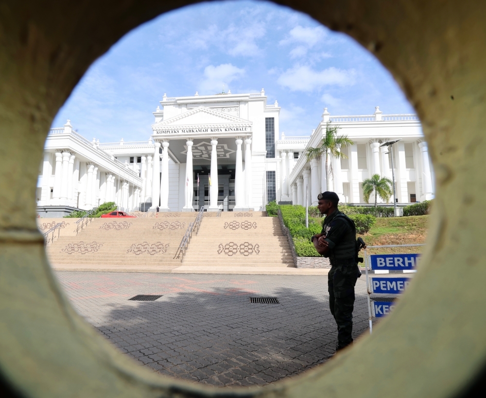 AG’s guidance sought on media coverage as child witnesses begin testifying in Zara Qairina inquest File picture shows police standing guard outside the Kota Kinabalu Court Complex, in Kota Kinabalu, Sabah, September 3, 2025. — Bernama pic