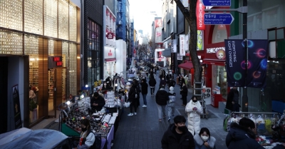 South Korea launches visa-free entry for Chinese tourists in push to boost economy Street vendors (L) wait for customers at Myeongdong shopping district in Seoul, South Korea, January 9, 2023. — Reuters