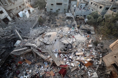 Trump to push Netanyahu on Gaza peace plan at White House In this aerial view, Palestinians check the rubble of a building destroyed by an Israeli strike in the Nuseirat refugee camp in the central Gaza Strip on September 28, 2025.  — AFP pic