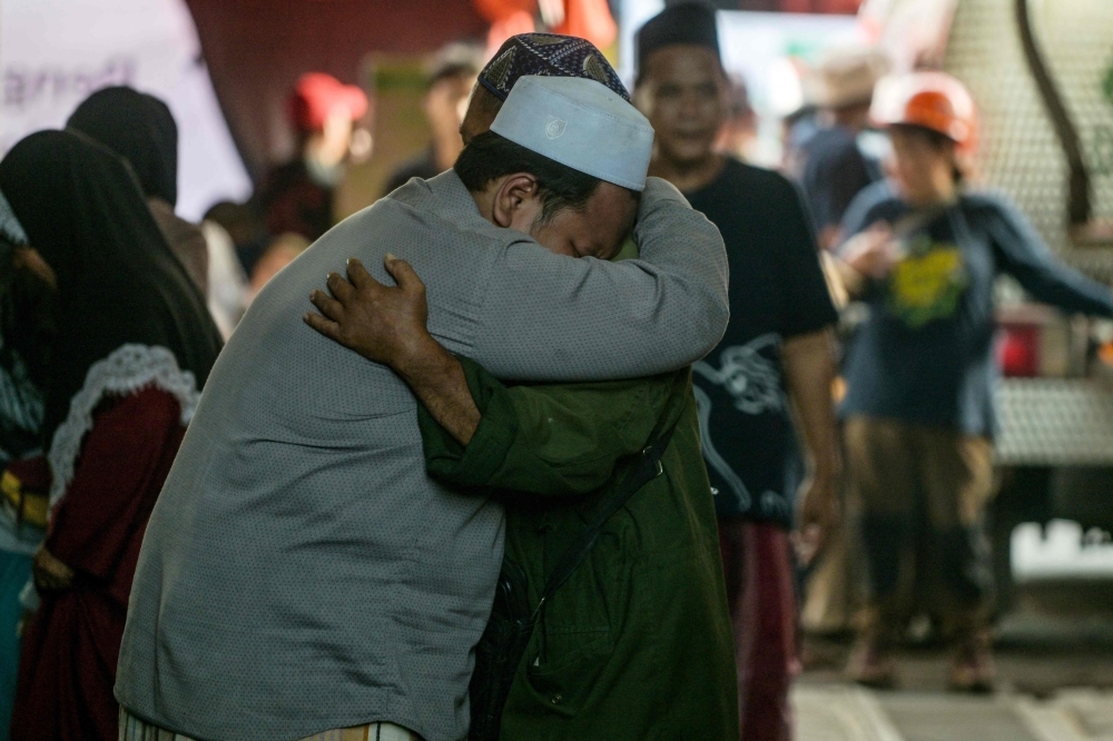 Indonesia school collapse: 59 people still trapped