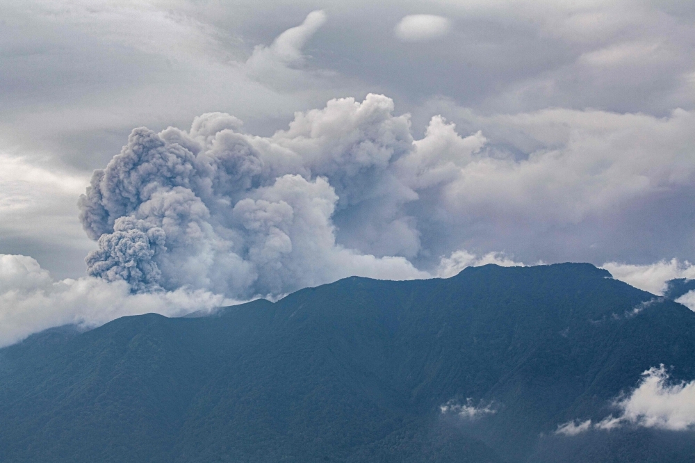 File picture of volcanic ash spewing from Mount Marapi during an eruption as seen from Tanah Datar in West Sumatra on December 3, 2023. Mount Marapi erupted early Tuesday, spewing volcanic ash over parts of West Sumatra and prompting authorities to warn residents and visitors to steer clear of the area and avoid any activity within three kilometres of the main crater, known as Verbeek. — AFP pic File picture of volcanic ash spewing from Mount Marapi during an eruption as seen from Tanah Datar in West Sumatra on December 3, 2023. Mount Marapi erupted early Tuesday, spewing volcanic ash over parts of West Sumatra and prompting authorities to warn residents and visitors to steer clear of the area and avoid any activity within three kilometres of the main crater, known as Verbeek. — AFP pic