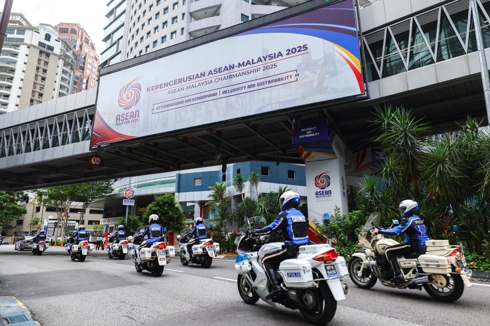 Show the world Malaysia is peaceful, IGP says ahead of planned anti-Trump protests during Asean Summit Police officers take part in a motorcycle rehearsal ahead of the 47th Asean Summit and related meetings at the Kuala Lumpur Convention Centre on October 22, 2025. — Bernama pic