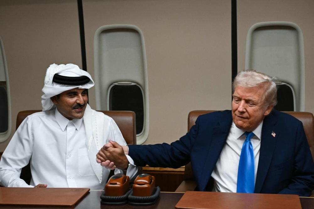 Trump meets Qatar leaders aboard Air Force One en route to Asia, credits them for key role in Gaza ceasefire deal