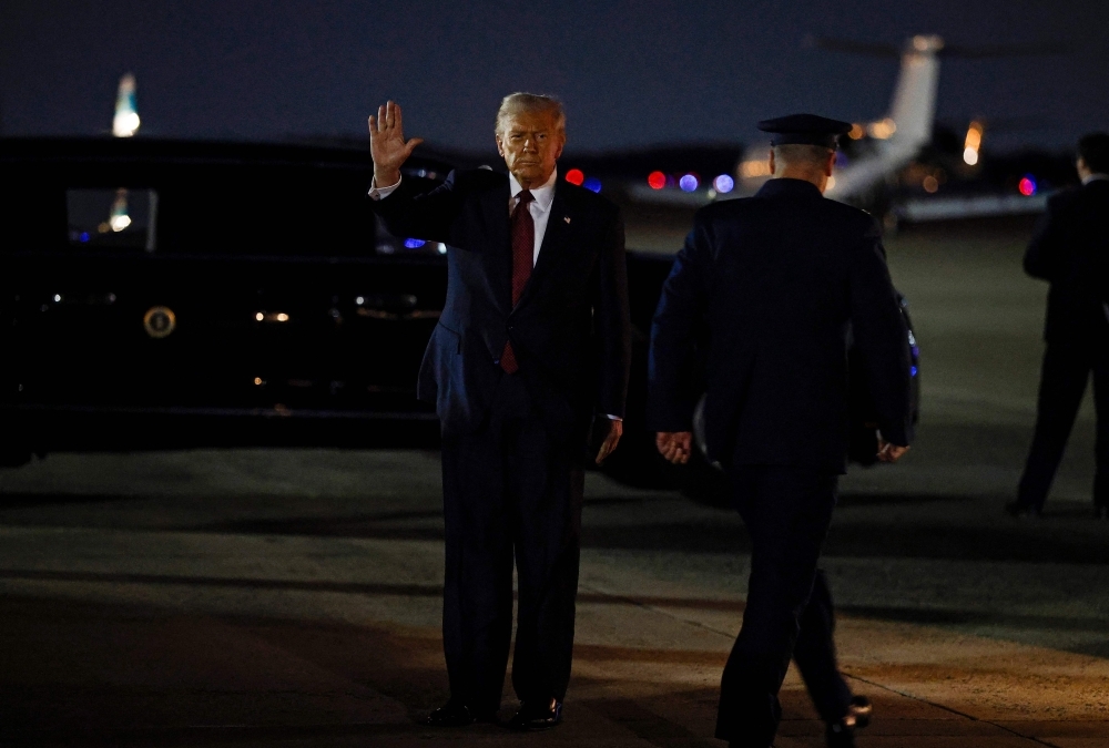 Trump left bruised after disastrous election night as failure to curb living costs fuels Democrat gains US President Donald Trump waves after arriving at Joint Base Andrews on Nov 5, 2025. — AFP pic