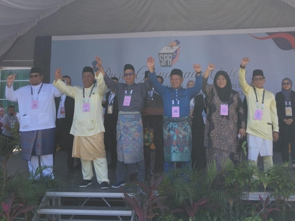 Sabah polls: Hazem Mubarak says Sungai Manila bid is his own, not because of his father Hazem with the other candidates. — Daily Express pic