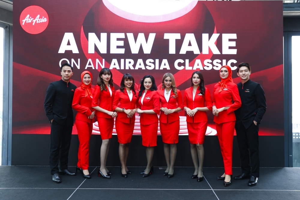Hijab-friendly uniforms take flight as AirAsia lets its crew put their own spin on red AirAsia’s female cabin crew will soon be able to wear the hijab as part of the airline’s iconic red uniform, if they wish. — Picture courtesy of AirAsia