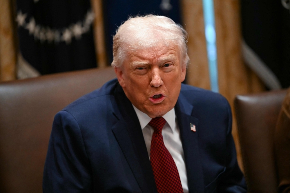 Trump threatens new 5pc tariff on Mexico over alleged water treaty breach US President Donald Trump speaks during a roundtable event in the Cabinet Room of the White House. — AFP pic