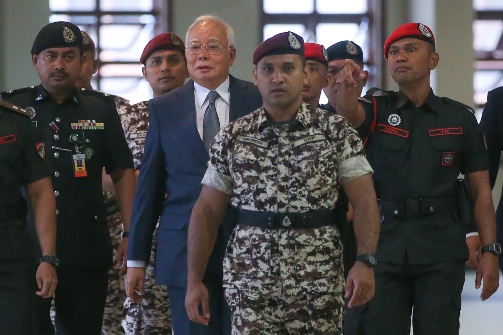 Najib’s 1MDB trial, from first charge to final High Court sentence In 2018, Datuk Seri Najib Razak was first charged at the Kuala Lumpur Sessions Court with four counts of abuse of power, amounting to RM2.3 billion in 1MDB funds, and 21 counts of money laundering related to the same amount. — Picture by Yusof Mat Isa
