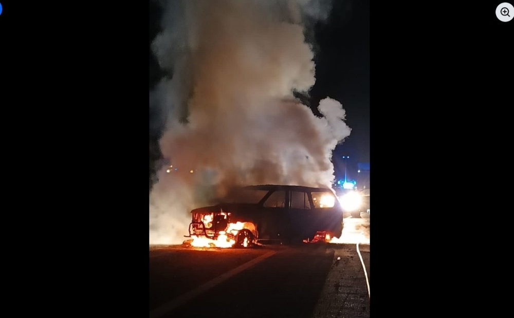 Two injured as car bursts into flames after crash on NSE near Gopeng Two people, including an elderly woman, were hurt after their car caught fire in a crash on the northbound North-South Expressway near Gopeng early Wednesday. — Picture from Facebook