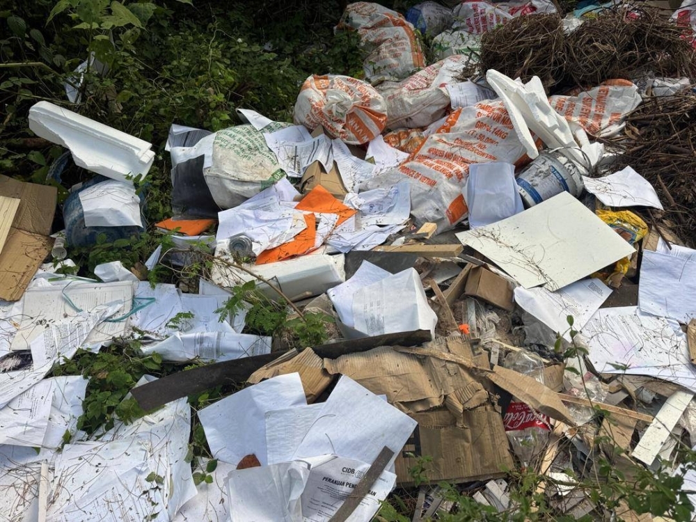 Putatan council probes sacks of dumped files after viral beach video sparks outrage Putatan District Council is investigating reports that sacks of documents, allegedly from several government departments, were found dumped at a beach near the Putatan Public Market. — Picture via Facebook