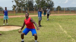 A young female athlete prepares to throw a disc during the just-concluded training camp in Gicumbi. The Rwanda Athletics Federation (RAF) president Lt. Col (Rtd) Lemuel Kayumba believes their new talent search could help them produce new athletes with potential to win medals on the global stage.Courtesy 
