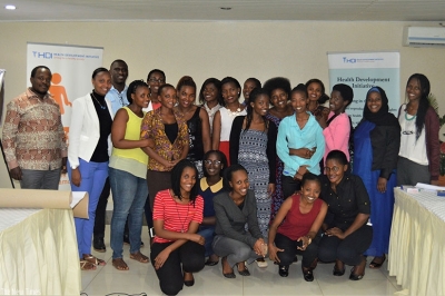 Participants in the workshop on HIV pose for a group photo after the event. (Francis Byaruhanga)