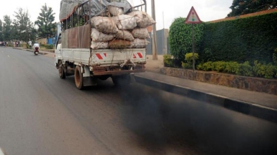 A vehicle pollutes the environment on Kanombe-Remera road. / File