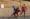 حمد العريمي لاعب قريات يحاول الحفاظ على الكرة وسط متابعة من لاعب صحم فهد اللوغاني                    تصوير: عبدالواحد الحمداني
