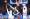 لاعب فينيكس صنز ريس بيكمان يسدد الكرة في سلة فريق بوسطن سلتيكس