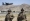 In this image provided by the Department of Defense, two paratroopers assigned to the 1st Brigade Combat Team, 82nd Airborne Division conduct security while a C-130 Hercules takes off during a evacuation operation in Kabul, Afghanistan, Wednesday, Aug. 25, 2021. Photo: AP