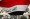 محتجون يرفعون علم العراق امام البرلمان العراقي 