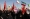 إيرانيات بجنازة حيدري ومهقاني في طهران أمس (رويترز)