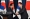 رئيس كوريا الجنوبية يون سوك يول يصافح رئيس الوزراء الياباني فوميو كيشيدا