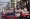 المرشحان لرئاسة الوزراء يركبان سيارة مكشوفة خلال حدث قافلة الحملة في بانكوك 