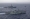 سفينتان أميركية وكندية خلال عبورهما مضيق تايوان (رويترز)