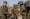 وزير الدفاع الروسي يلتقي جنديات خلال تفقده معسكرات في الجنوب  (أ ف ب)