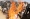 عناصر حوثية تحرق العلمين الأميركي والبريطاني خلال تظاهرة في صنعاء أمس (رويترز)