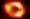  صورة من «إيفنت هورايزون تلسكوب» تظهر حلقة ضوء برتقالية تتخللها خطوط منتظمة تزنّر «ساجيتاريوس أيه*»