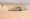 صورة وزّعتها وزارة الدفاع الإسرائيلية لدبابة تُجري مناورة بمنطقة صحراوية أمس (شينخوا)