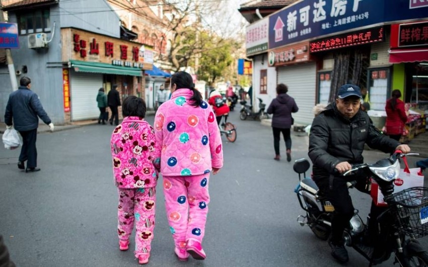 مدينة صينية تفضح المتجولين بملابس النوم