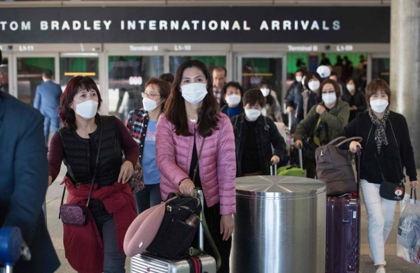 «الصحة العالمية»: الإجلاء من الصين قد يعني تصدير فيروس كورونا