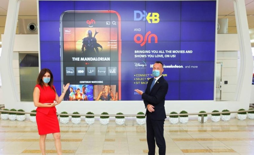 شراكة بين مطارات دبي و«OSN» لتقديم خدمات ترفيهية للمسافرين