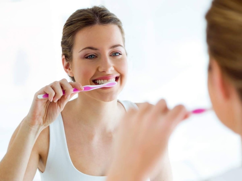 عادة في تنظيف الأسنان قد تقلل الإصابة بفيروس كورونا
