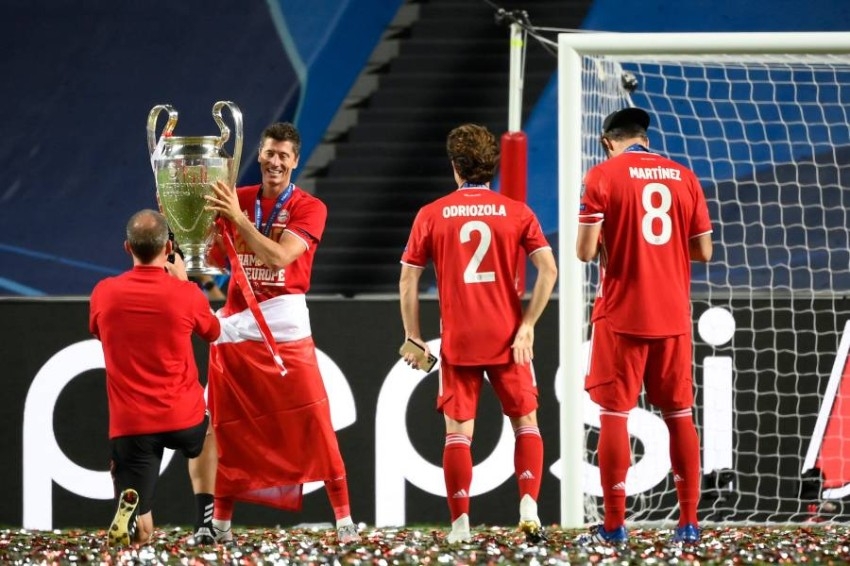 لاعبو بايرن ميونيخ ولقب دوري أبطال أوروبا. (AFP)