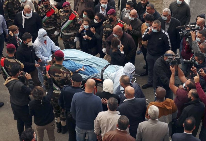 استعدادات لجنازة كبير المفاوضين الفلسطينيين وسط مراسم عسكرية