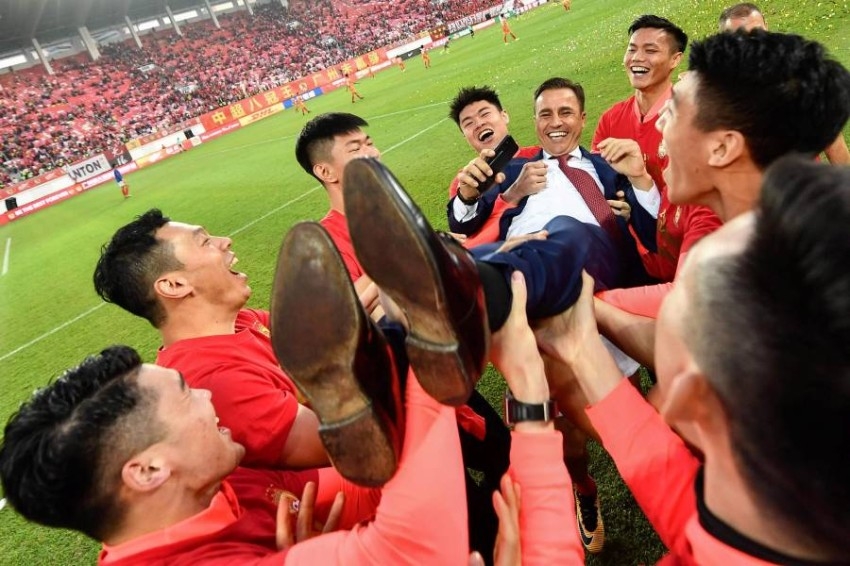 مشجعو كرة القدم في الصين يتحدون لمواجهة قرار تغيير أسماء أنديتهم