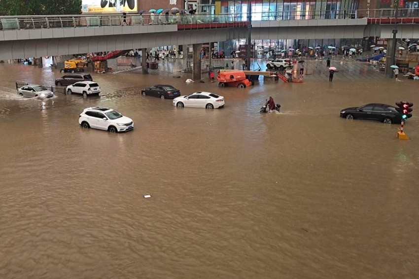 بالصور.. فيضانات الصين تُجلي 200 ألف شخص من بلداتهم