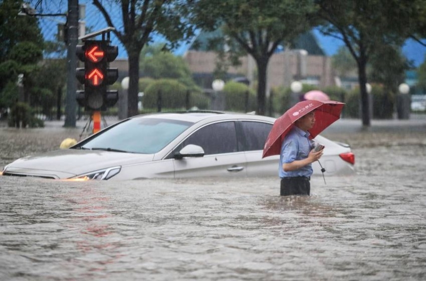 بالصور.. فيضانات الصين تُجلي 200 ألف شخص من بلداتهم