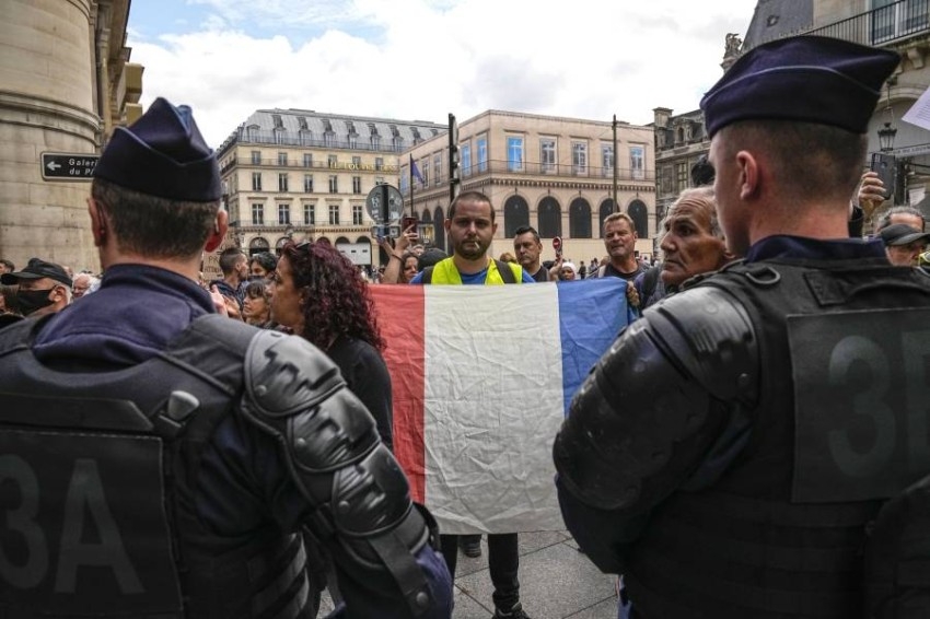 متظاهرون في باريس ضد الجواز الصحي. (أ ب)