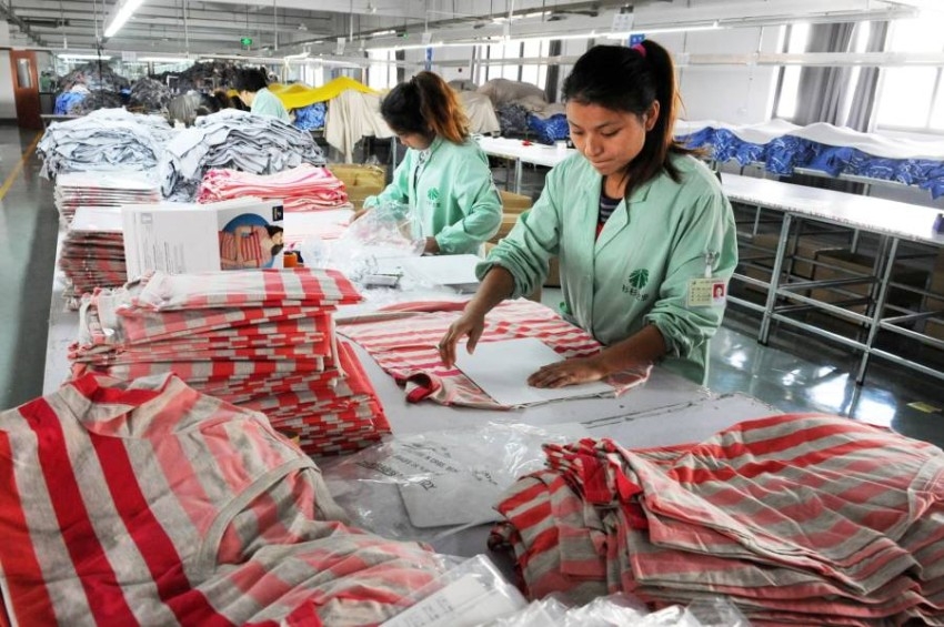 صناعة الملابس بالصين تسجل نمواً في الإيرادات والأرباح